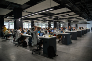 Study Finds Heaviest AI Spenders Are Hiring More, Not Less
