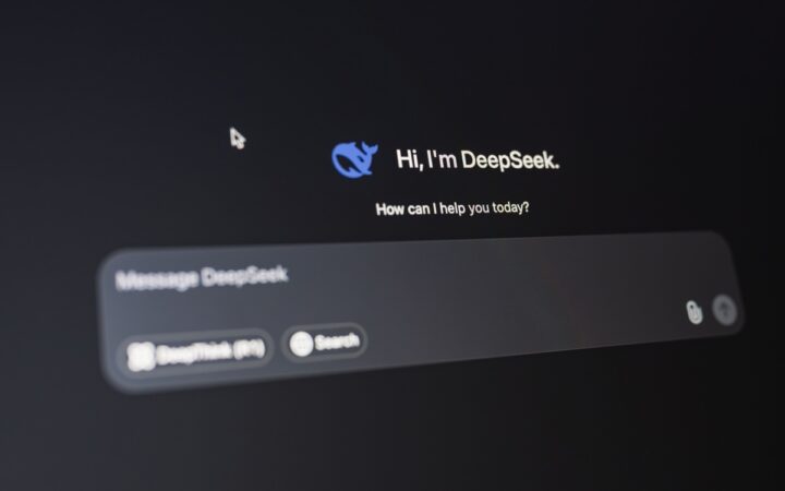 Real close-up photograph of the DeepSeek chatbot greeting and message box on a computer screen